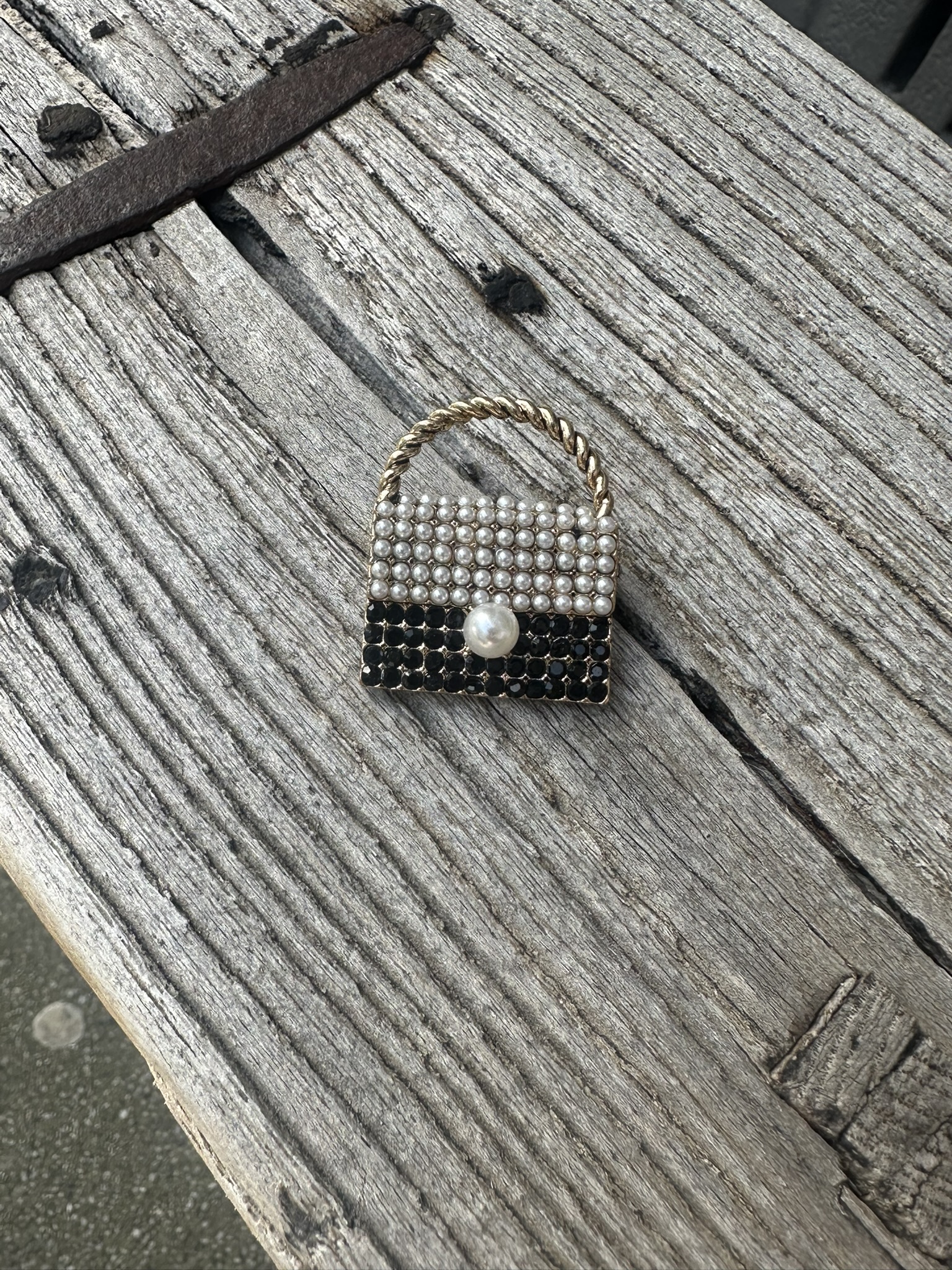 Broche Tasje